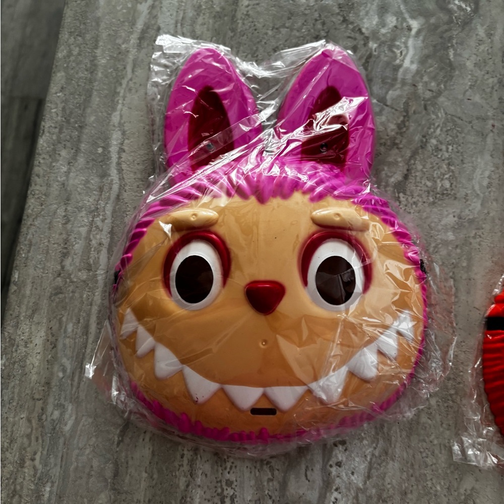 Pink Labubu face mask Halloween
New